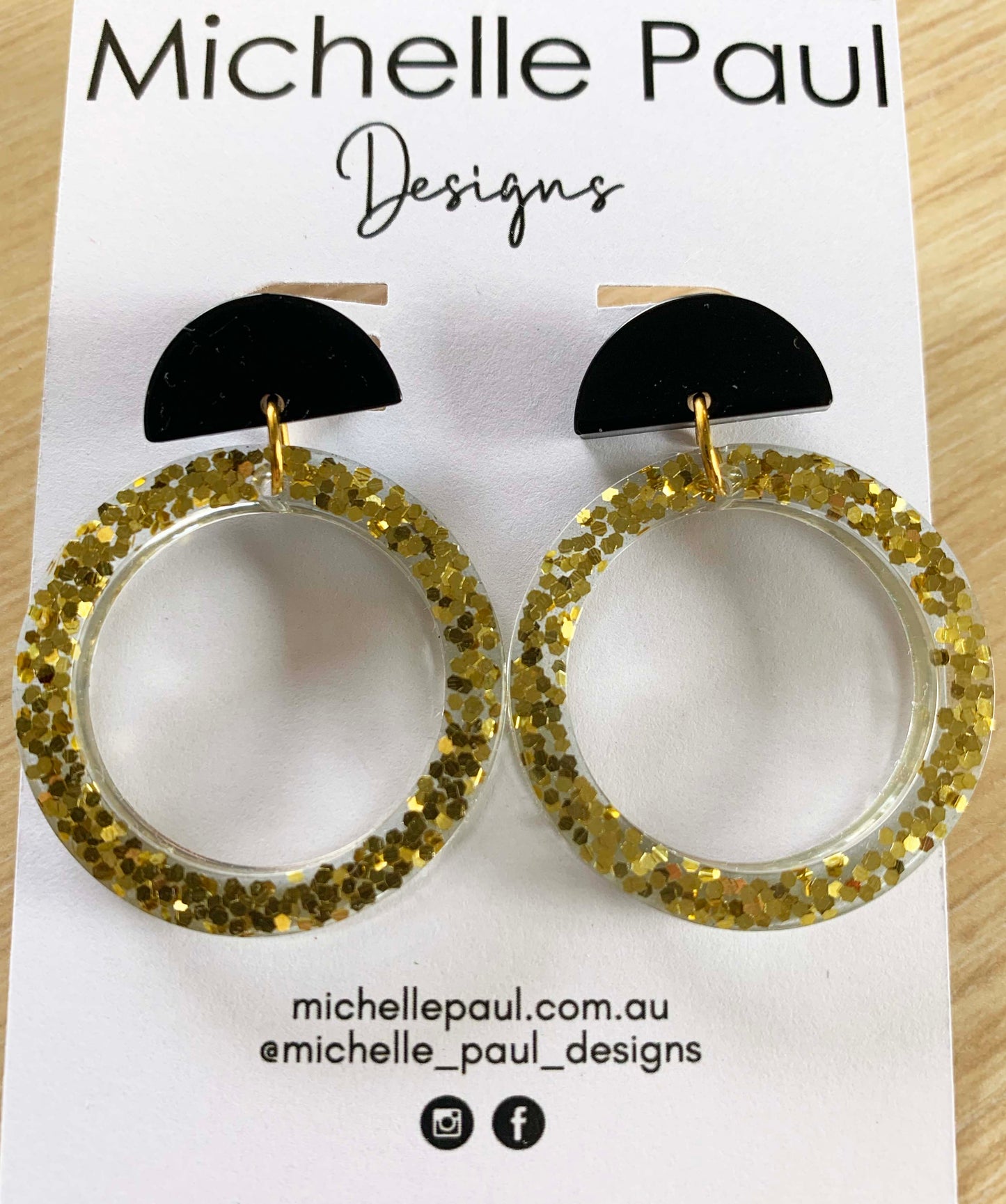 Golden hoop drop studs